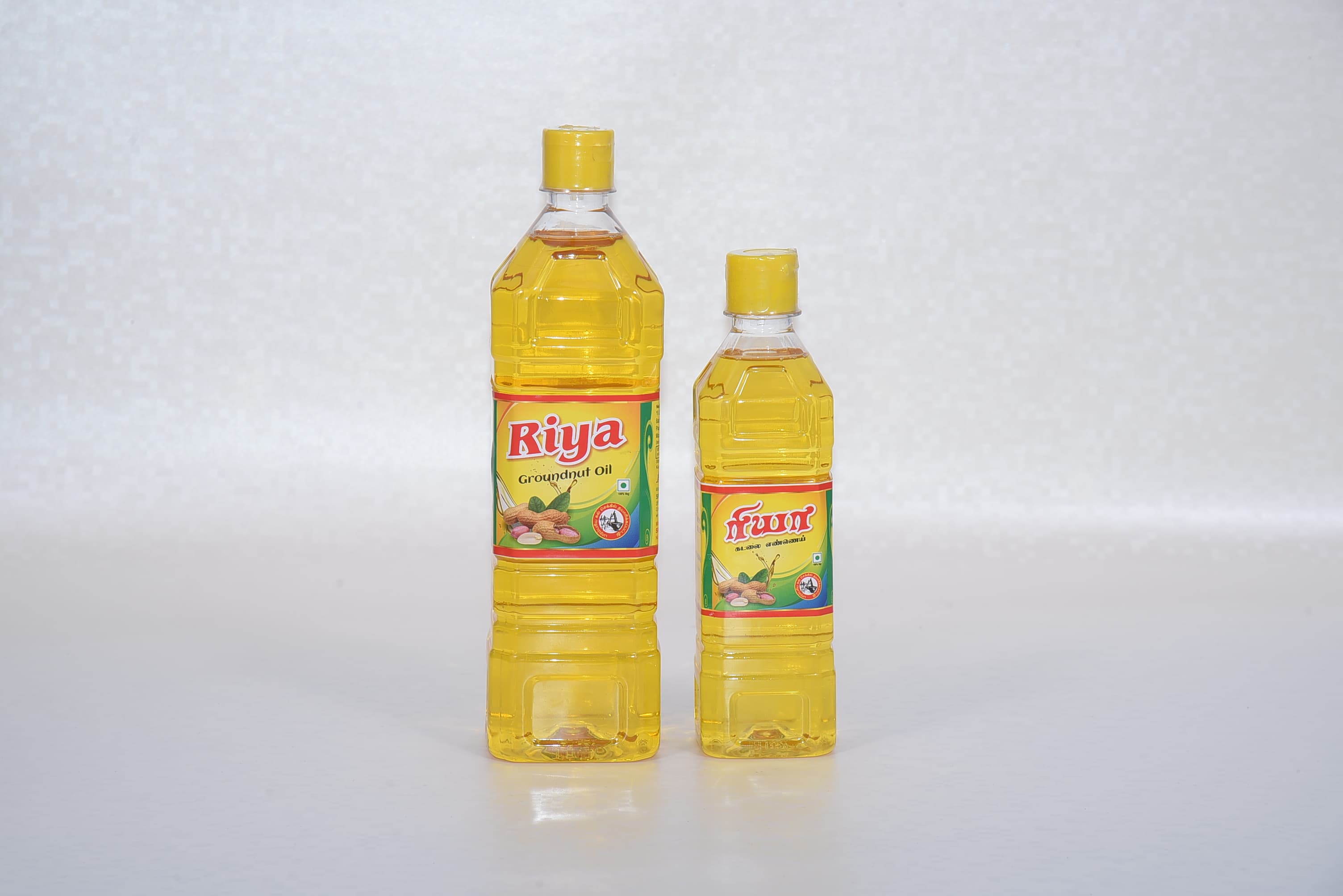 Riya Groundnut Oil bottles